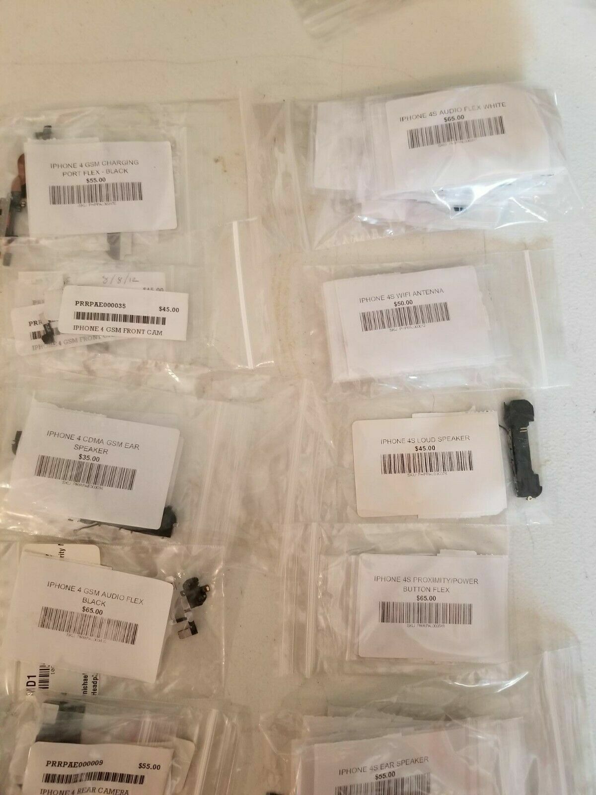 iPhone 4/4s Parts Lot (Flex Cables, Cameras, Back Covers, Vibrate Motor & More)